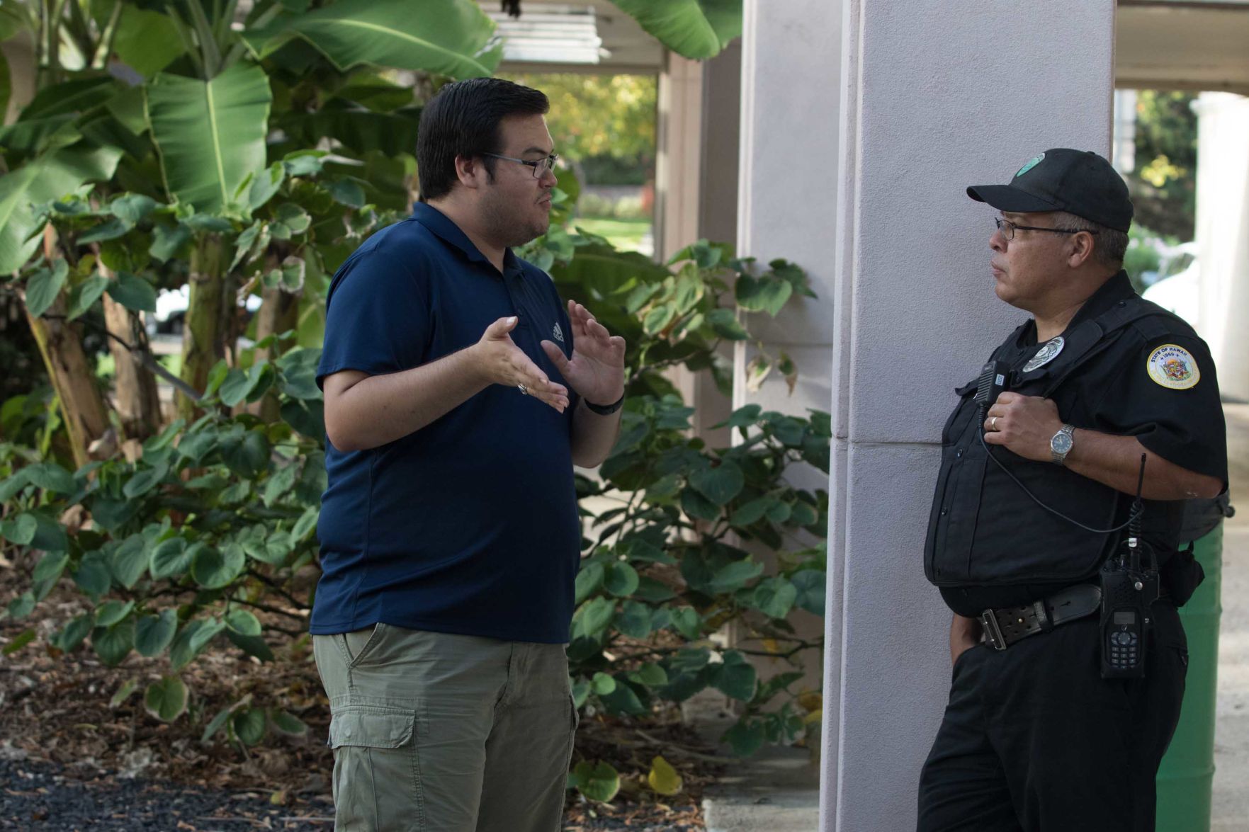 Micah Leval speaking to DPS Officer